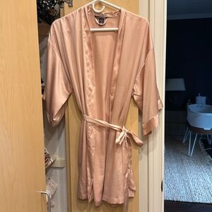 Victoria’s Secret satin robe in rose pink